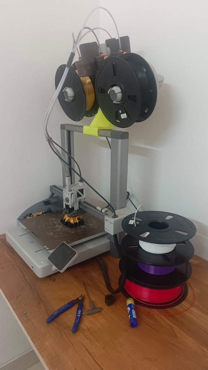 Bambu Lab A1 with filament spools set up in my workshop