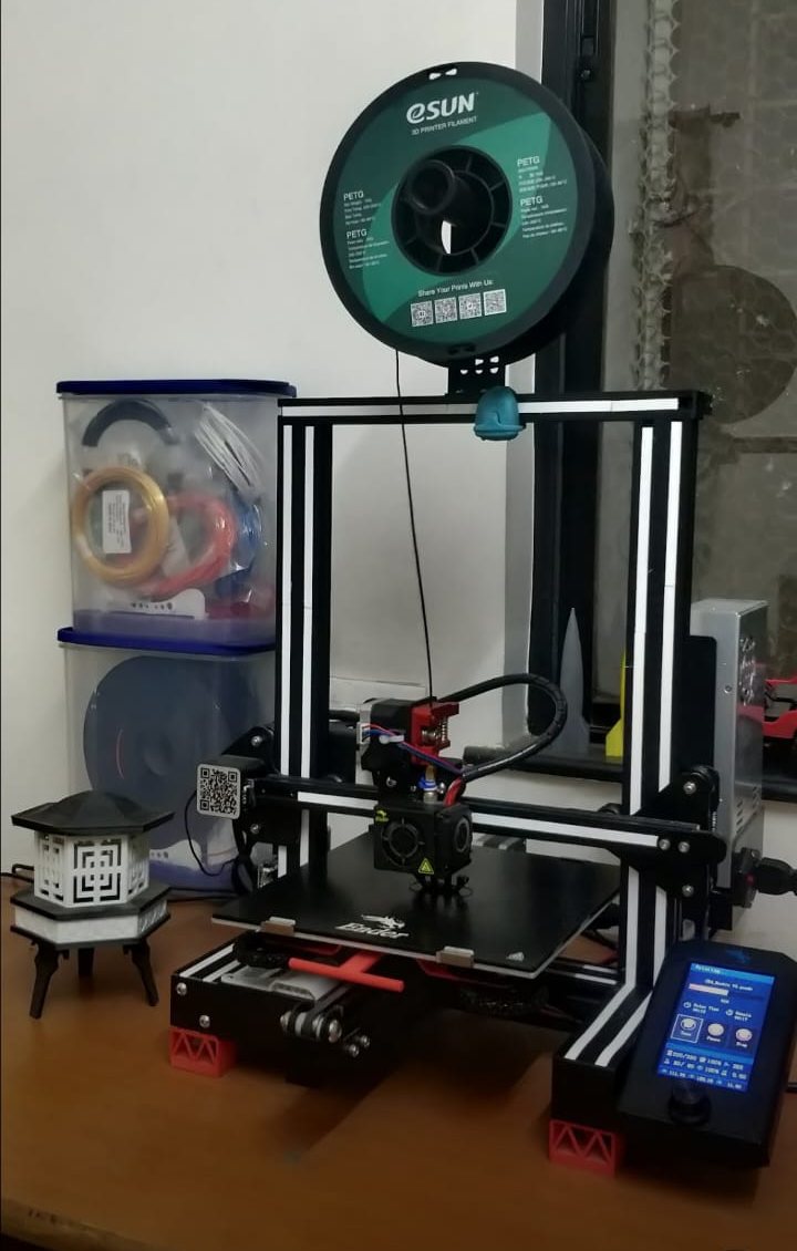 Creality Ender 3 printing with an eSUN PETG spool and a filament dry box in an India workshop