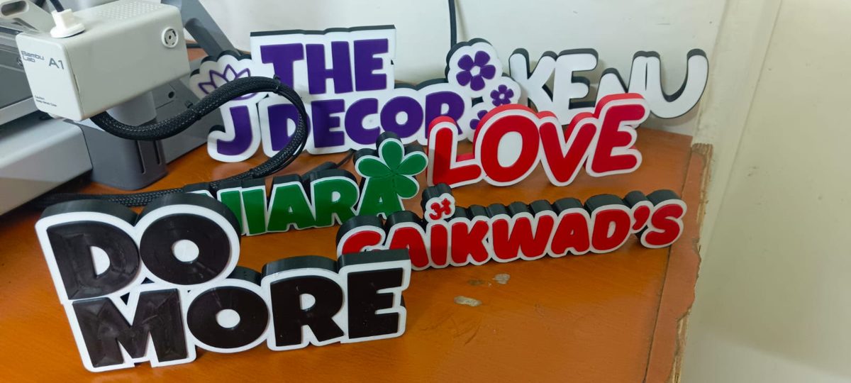 Multicolour 3D printed name signs printed on the Bambu Lab A1